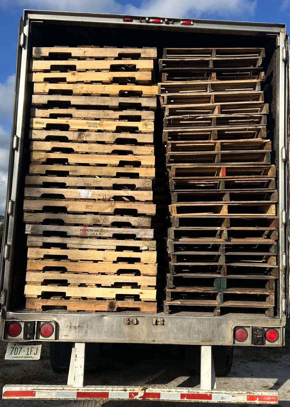 Dry van trailer loaded with pallets on freight corridor
