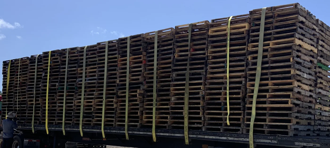 Flatbed pallet delivery on freight corridor