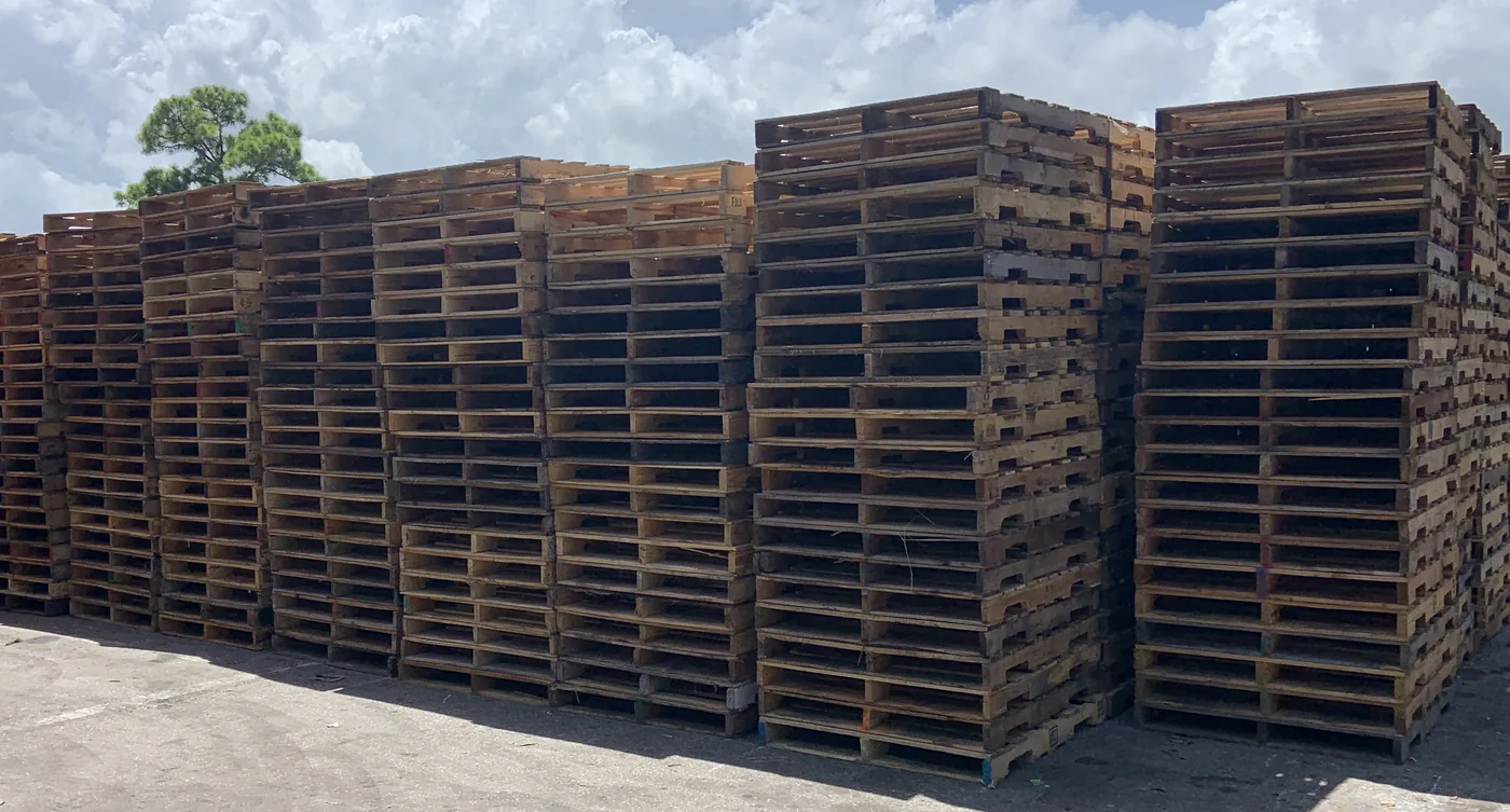 Recycled pallets in large warehouse inventory