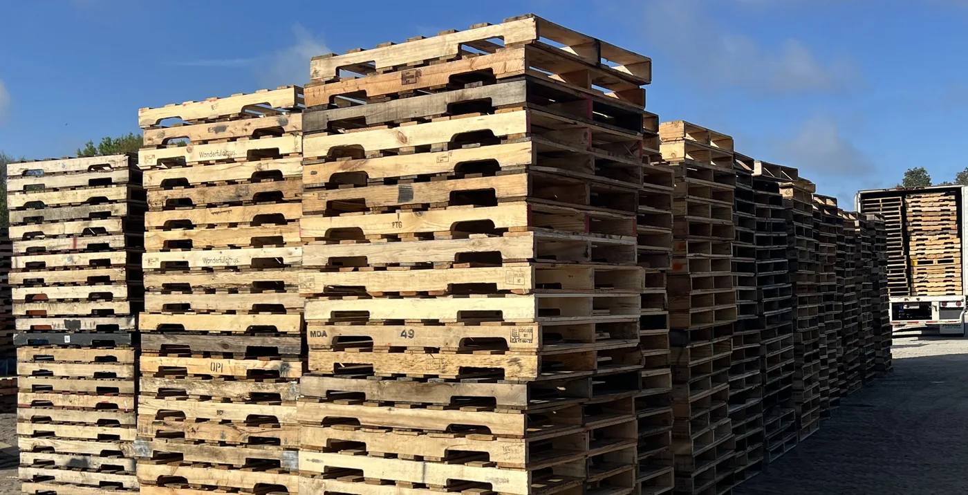 Recycled pallets in yard bulk warehouse inventory
